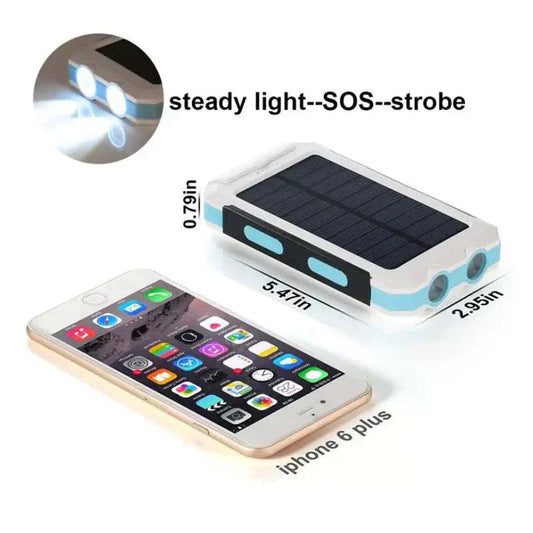 Jumbo Solar Power Bank with 20,000 mAh capacity, waterproof, dual LED lights, compass, and solar charging next to iPhone 6 Plus for size comparison